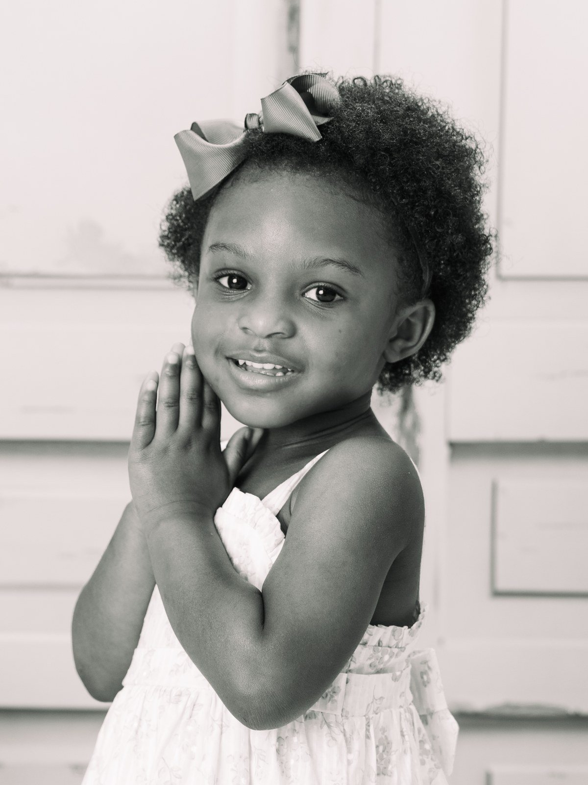 Little girl with hair bow portrait
